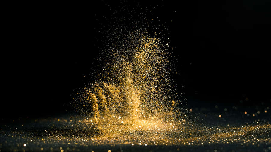 Sprinkled Black And Gold Glitter Wallpaper
