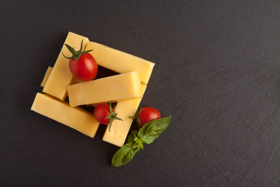 Square Cheese Blocks With Tomatoes Wallpaper