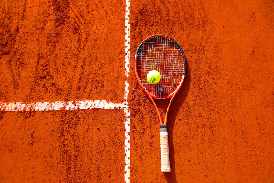 Squash Racket On Orange Floor Wallpaper