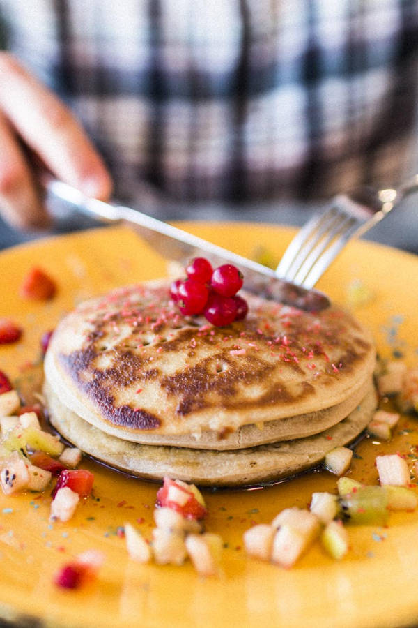 Stack Of Pancakes With Fruits Wallpaper