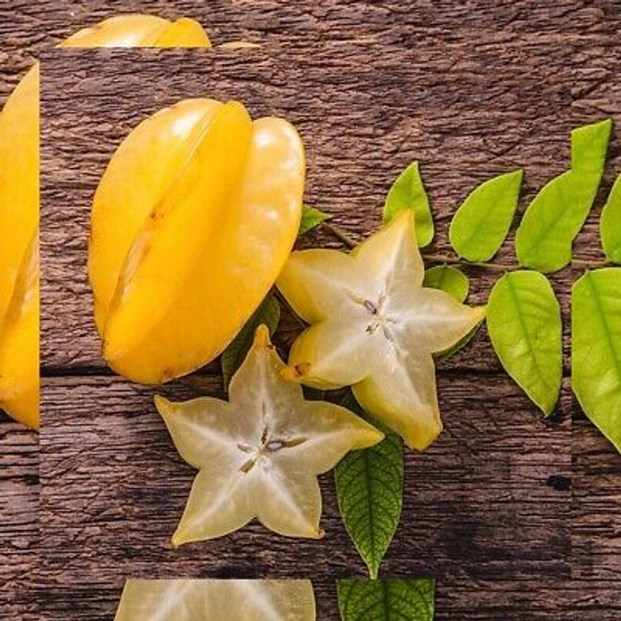 Star Fruit Leaves On The Table Wallpaper