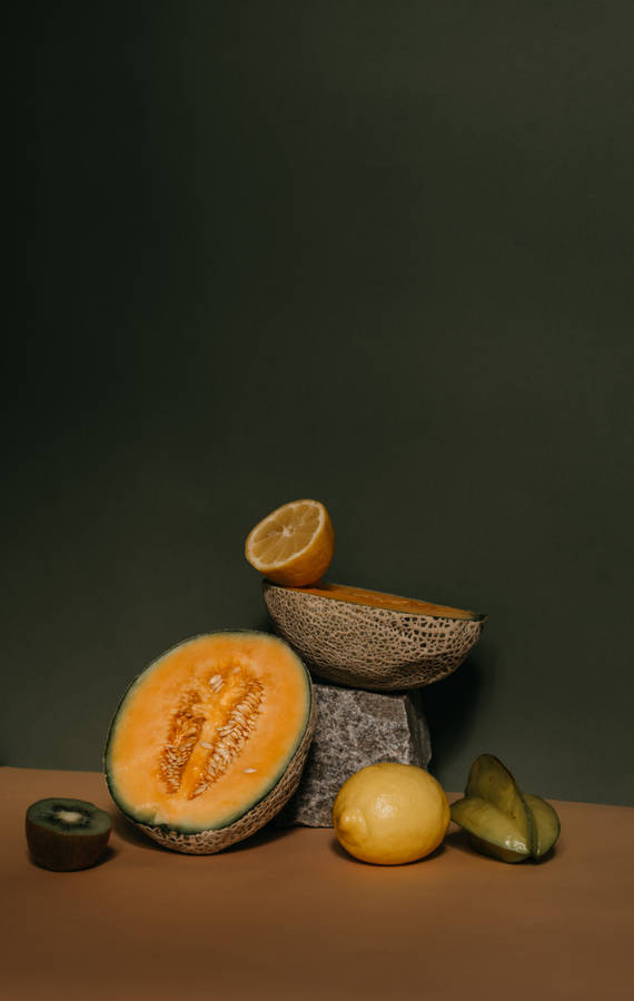 Star Fruit On The Brown Table Wallpaper