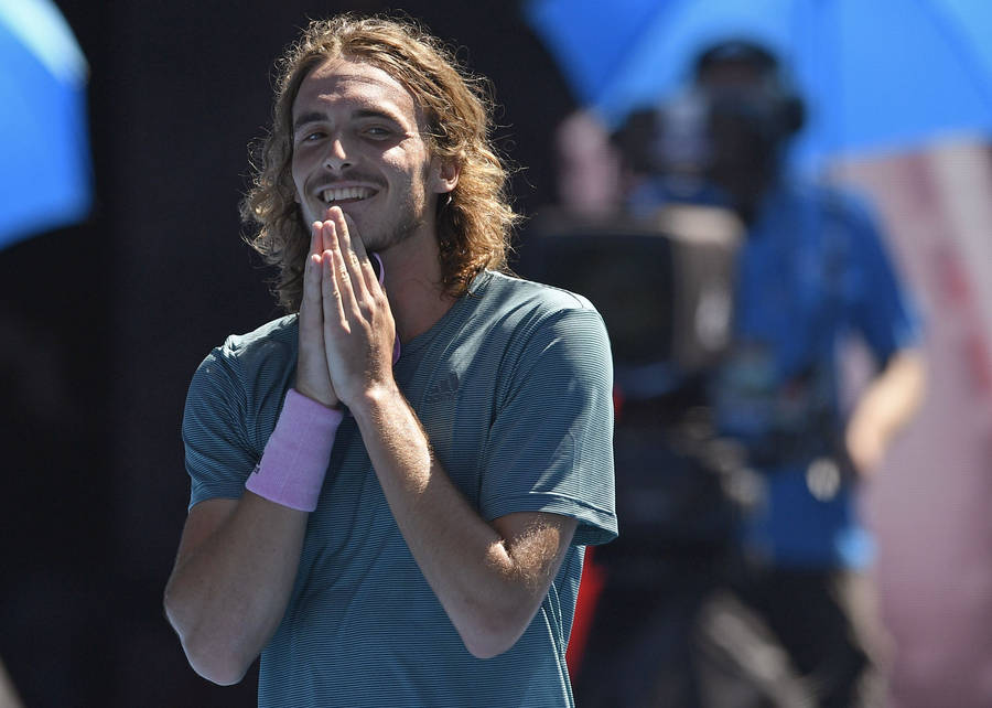 Stefanos Tsitsipas Hands Together Wallpaper