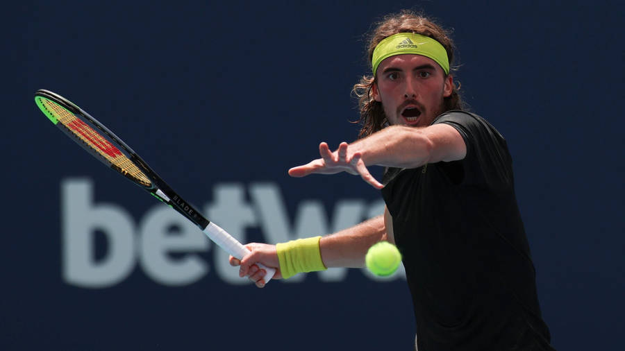 Stefanos Tsitsipas Ready To Hit The Ball Wallpaper