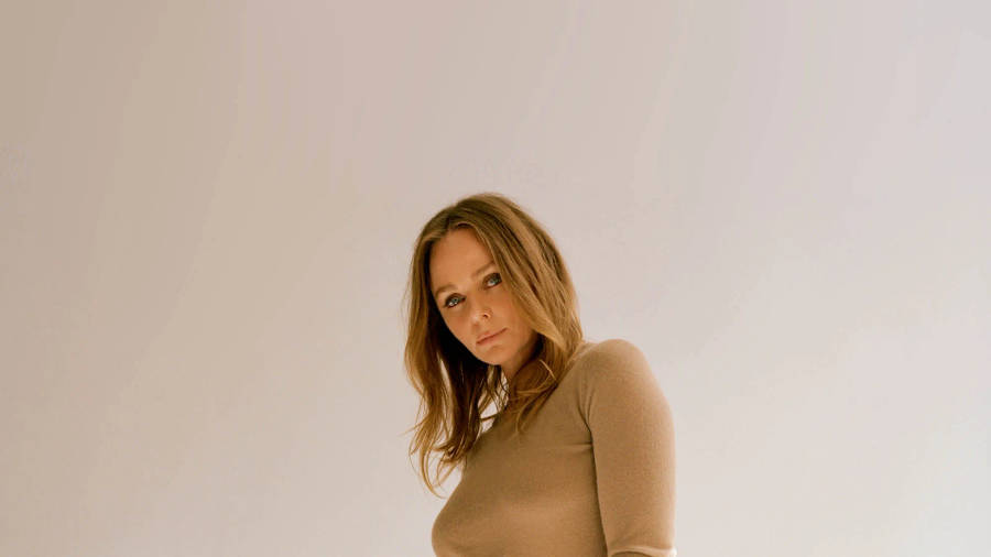 Stella Mccartney Elegance - Fashion Icon In A Beige Top Wallpaper