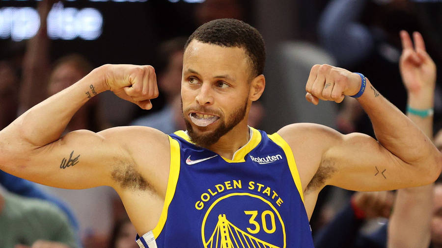 Steph Curry Doing A Muscle Pose Wallpaper