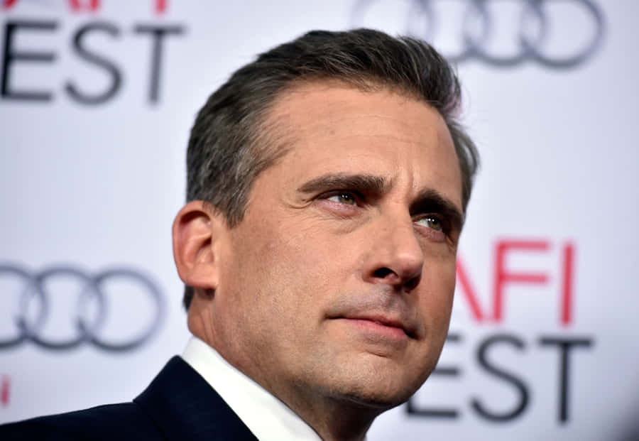 Steve Carell Looking On With A Smile Wallpaper