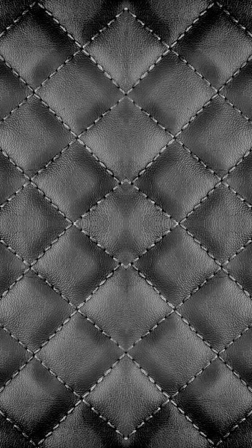 Stitched Upholstery Made Of Black Leather Iphone Wallpaper