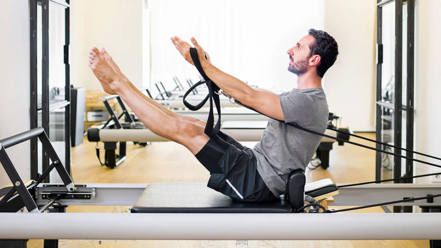 Strong Man In Pilates Wallpaper