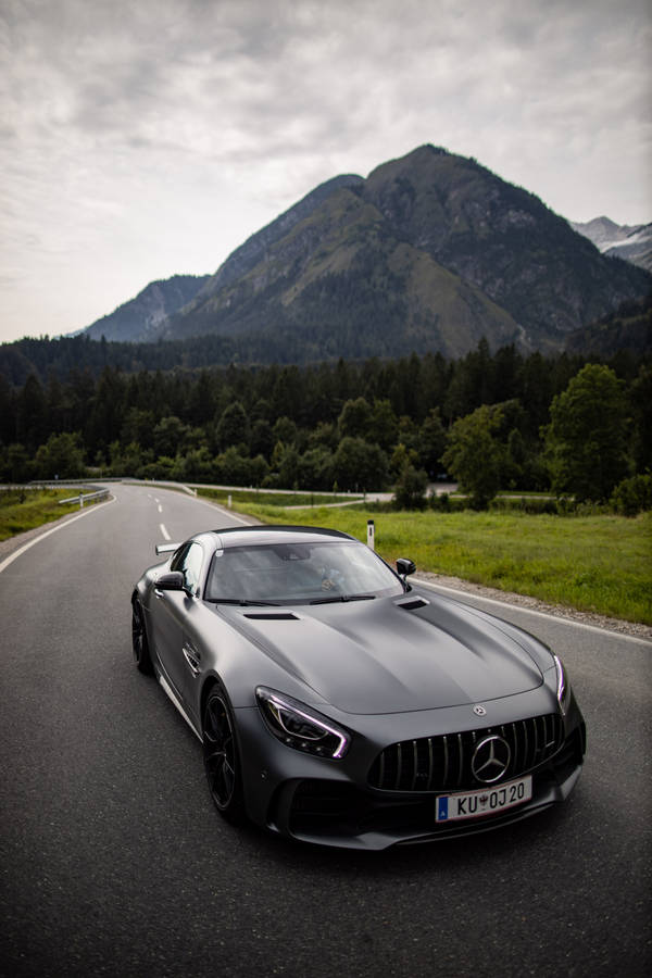 Stunning Amg Gtr Cruising On A Country Road Wallpaper