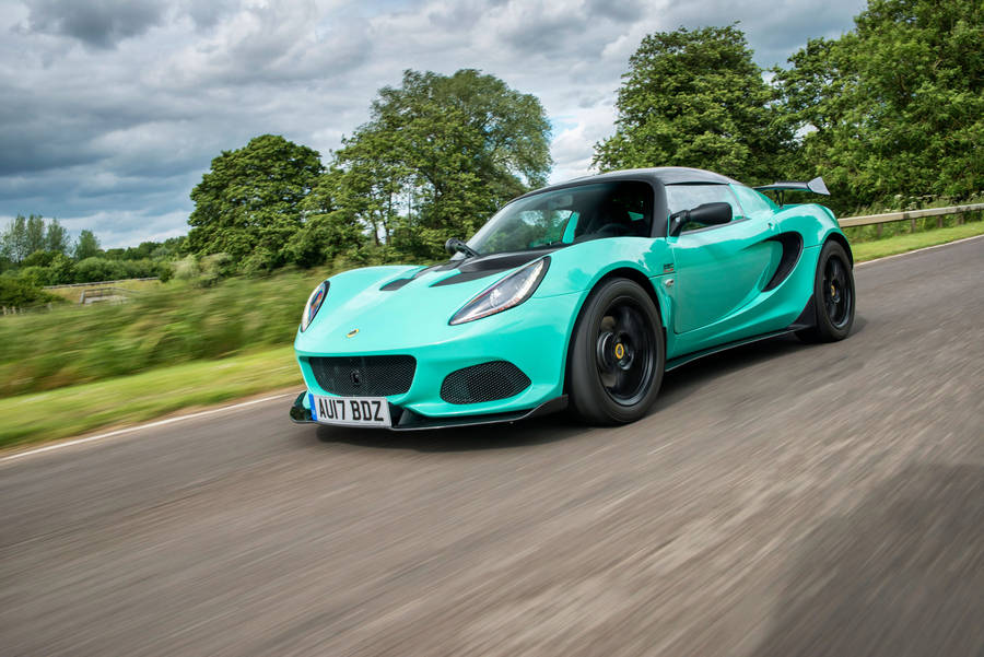 Stunning Aquamarine Lotus Sports Car Wallpaper