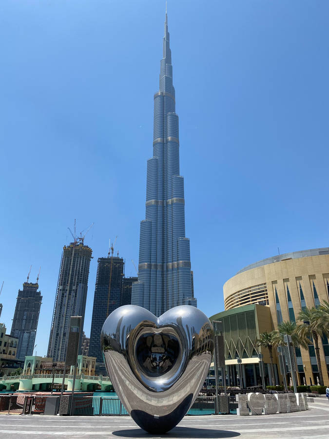 Stunning Monolithic Wonder Burj Khalifa Framed By Evening Sky Wallpaper