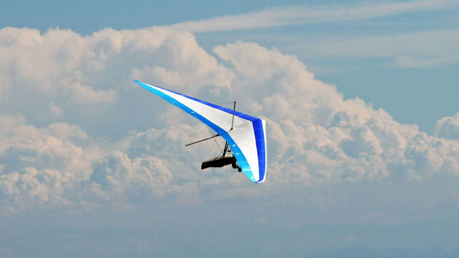 Stunning View Of Hang Gliding Adventure Wallpaper