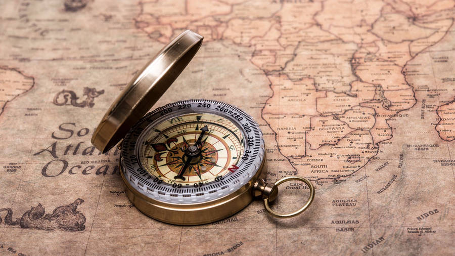 Stylish Golden Pocket Compass Wallpaper