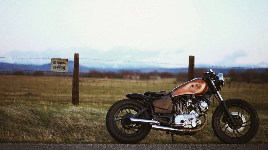 Sublime Yamaha Virago Bobber Motorcycle Gleaming In The Sun Wallpaper