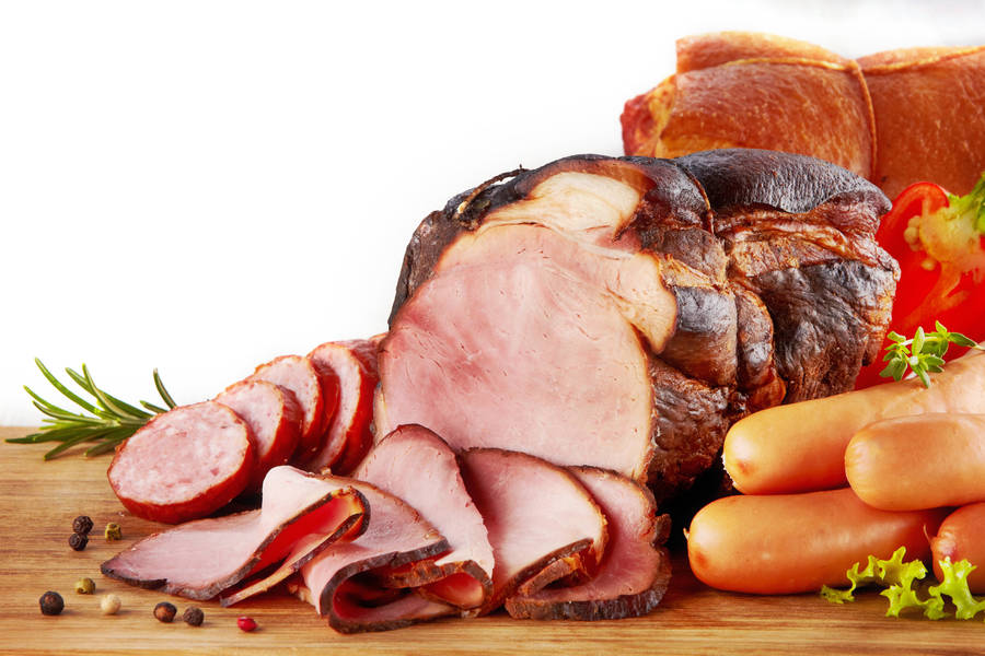 Succulent Roasted Ham On A Platter Wallpaper