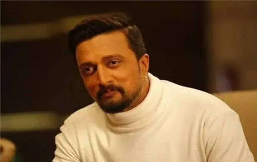 Sudeep In White Sweater Wallpaper