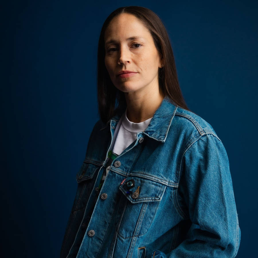 Sue Bird Denim Outfit Wallpaper