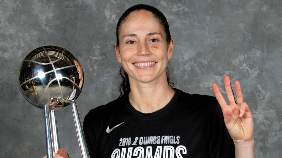 Sue Bird Trophy Portrait Wallpaper