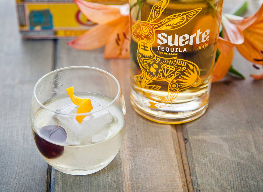 Suerte Anejo With An Orange Twist Wallpaper