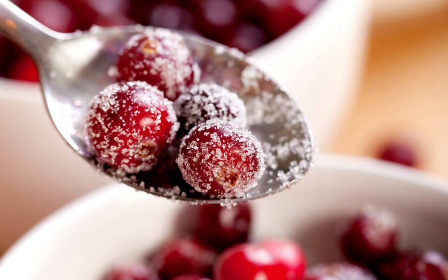 Sugar Coated Cranberries In Spoon Wallpaper