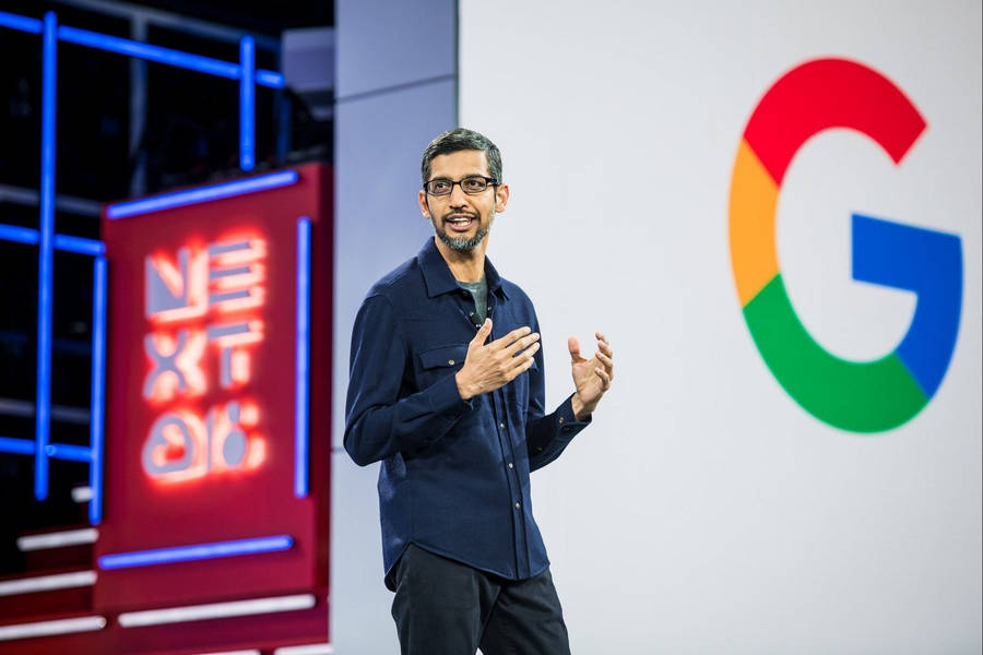 Sundar Pichai At A Google Conference Wallpaper