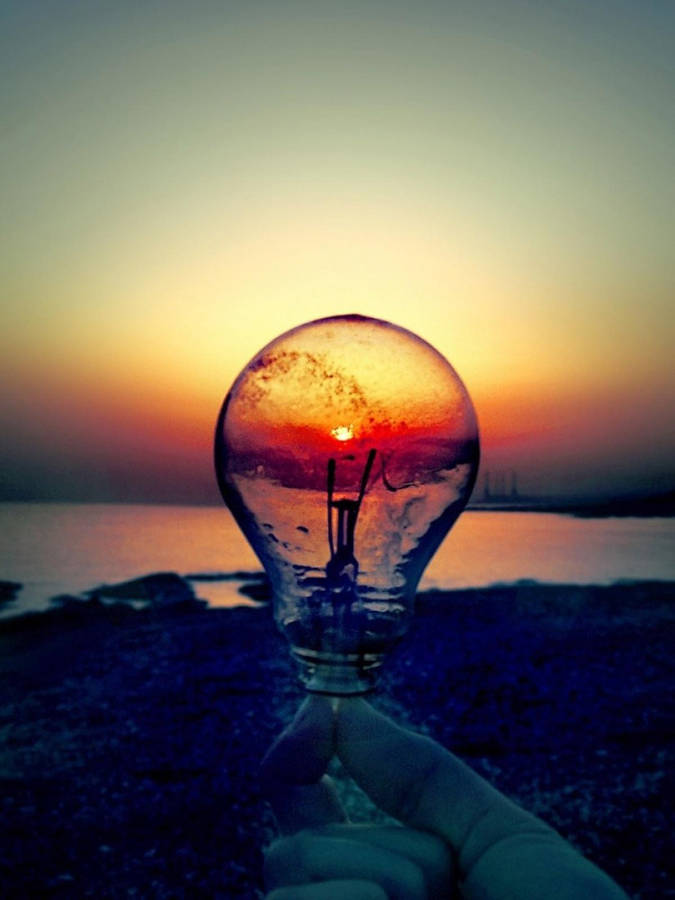 Sunset Beach Inside A Light Bulb Wallpaper