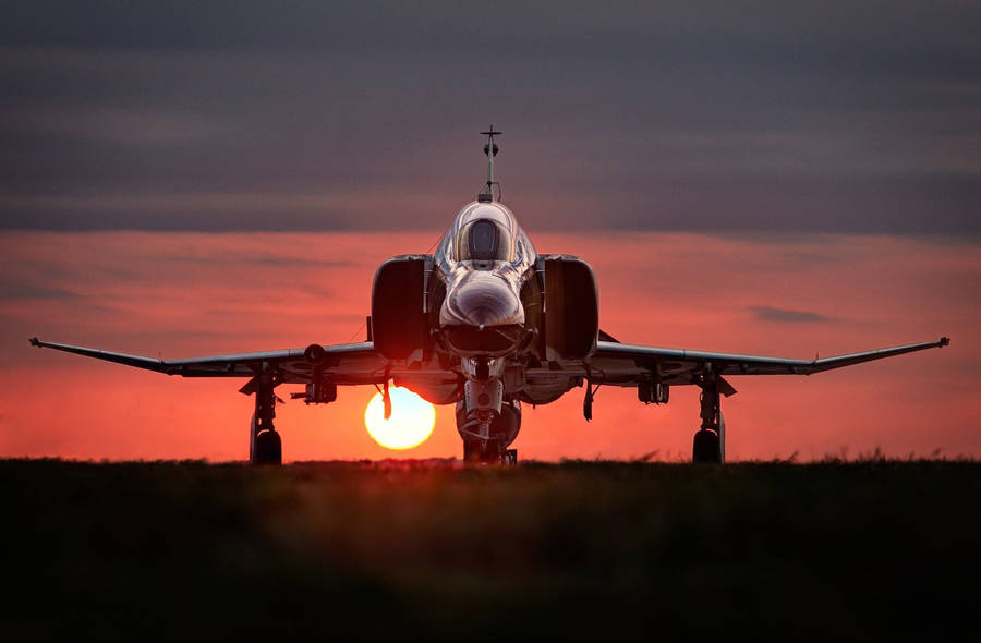 Sunset Behind A Military Aircraft Desktop Wallpaper