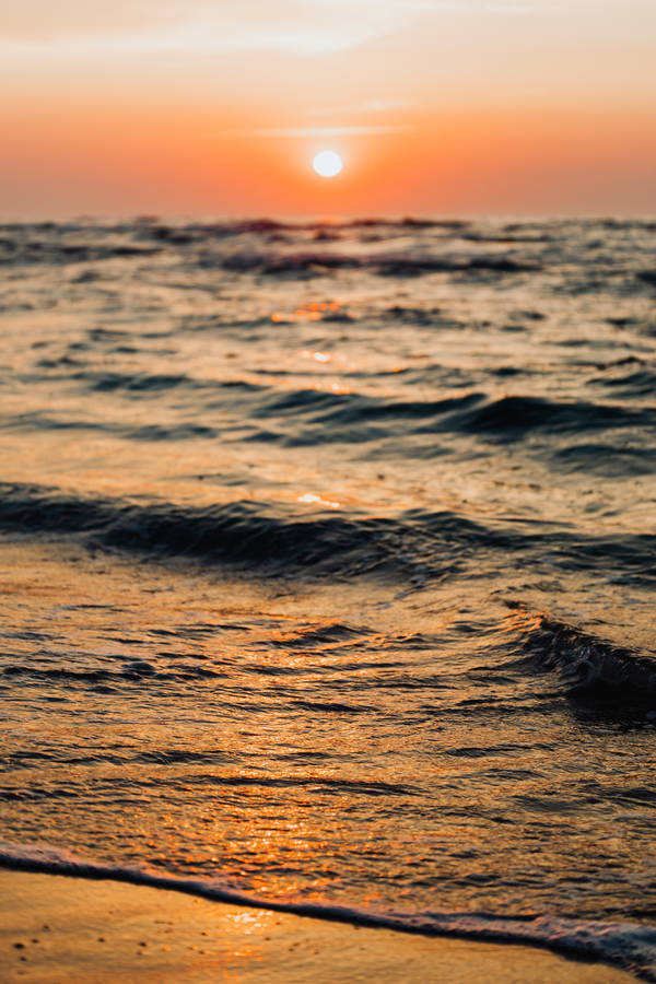 Sunset Over Beach Wave Iphone Wallpaper