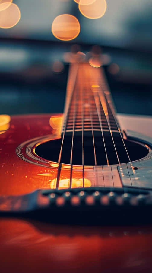 Sunset Serenade Guitar Wallpaper