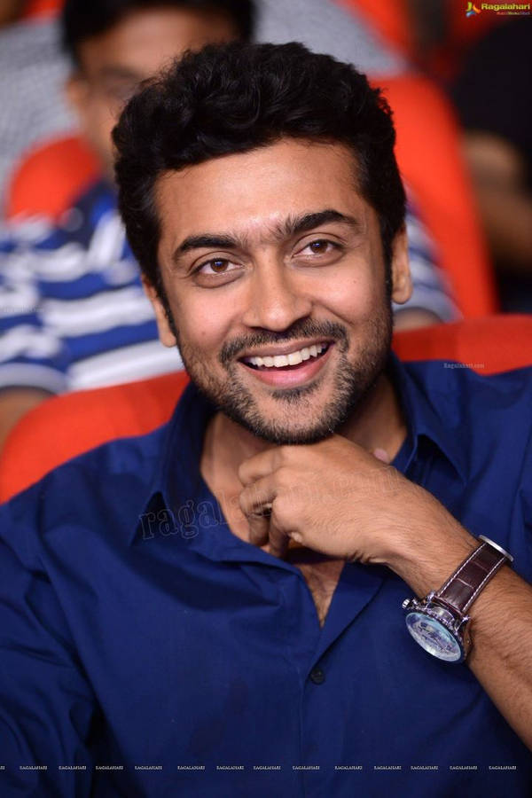 Surya Rubbing His Neck Hd Wallpaper