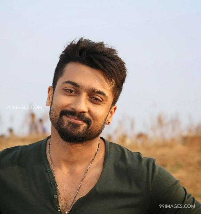 Surya Smiling At The Camera Hd Wallpaper