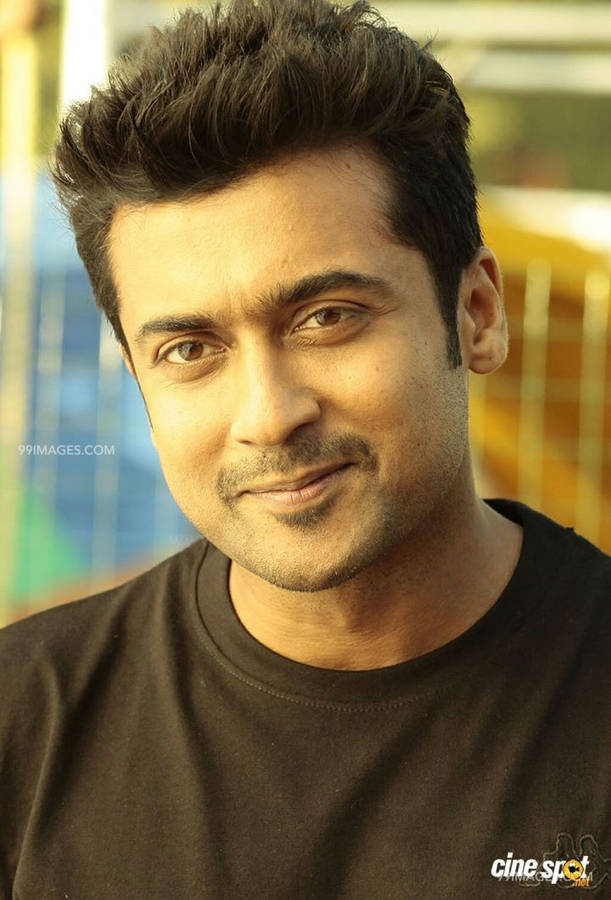 Surya Smirking Hd Wallpaper