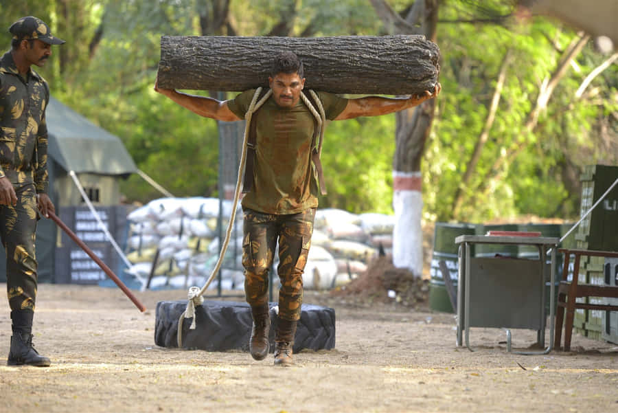 Surya, The Determined Soldier - A Still From The Movie 'surya The Soldier' Featuring Allu Arjun Wallpaper