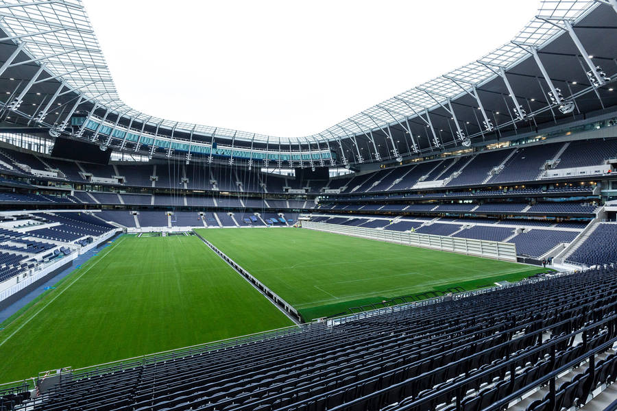 Sweeping View Of Tottenham Hotspur's Majestic Stadium Wallpaper