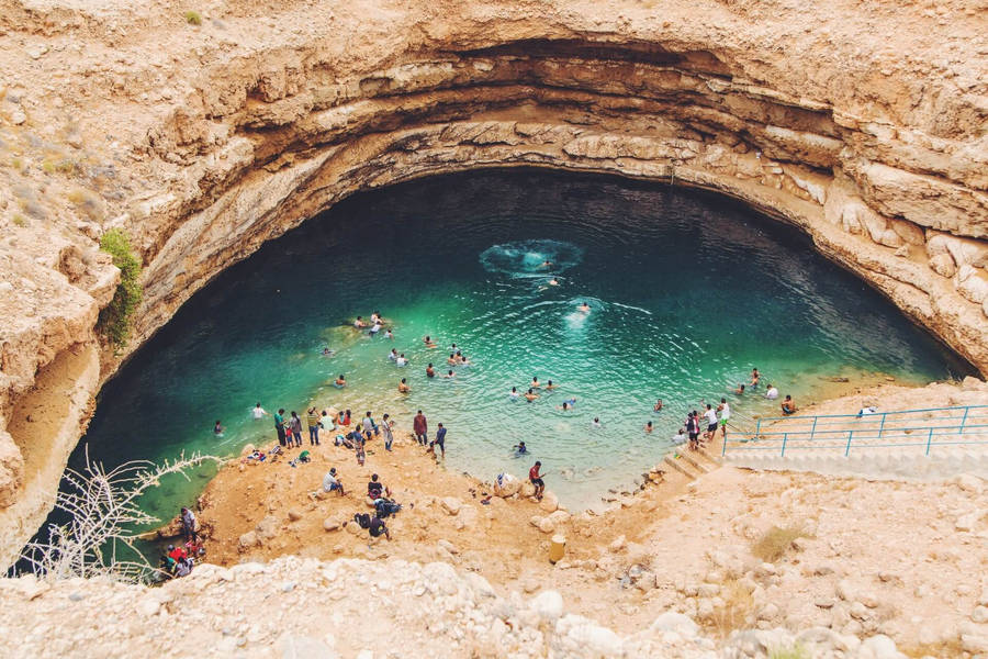 Swimming In Oman Bimmah Sinkhole Wallpaper