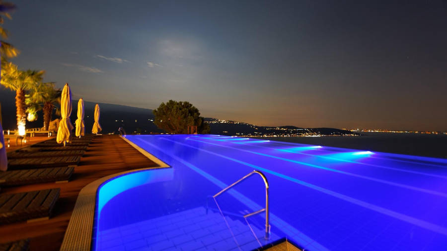 Swimming Pool City Lights Wallpaper