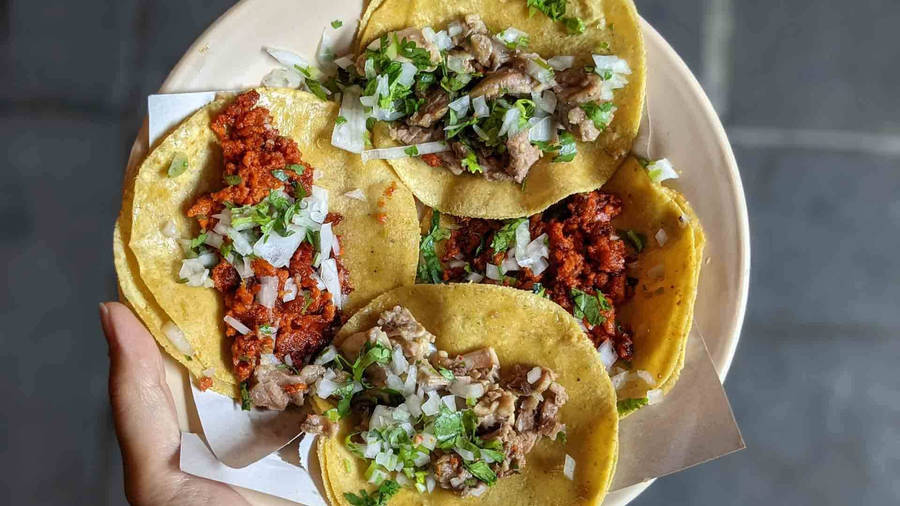 Tacos Al Pastor With Chopped Cilantro Wallpaper