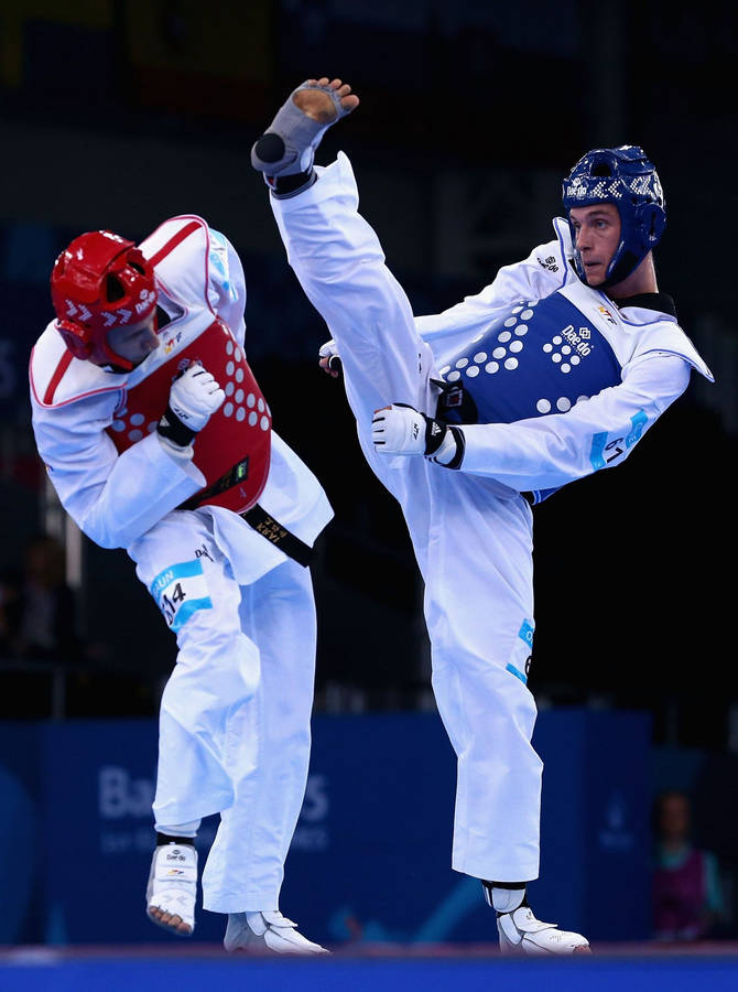 Taekwondo Athlete In Action At The Baku European Games Wallpaper