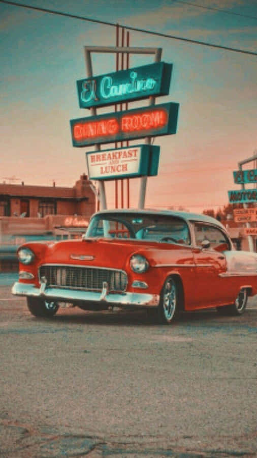 Take A Ride In Beauty And Nostalgia With A Vintage Car Iphone. Wallpaper