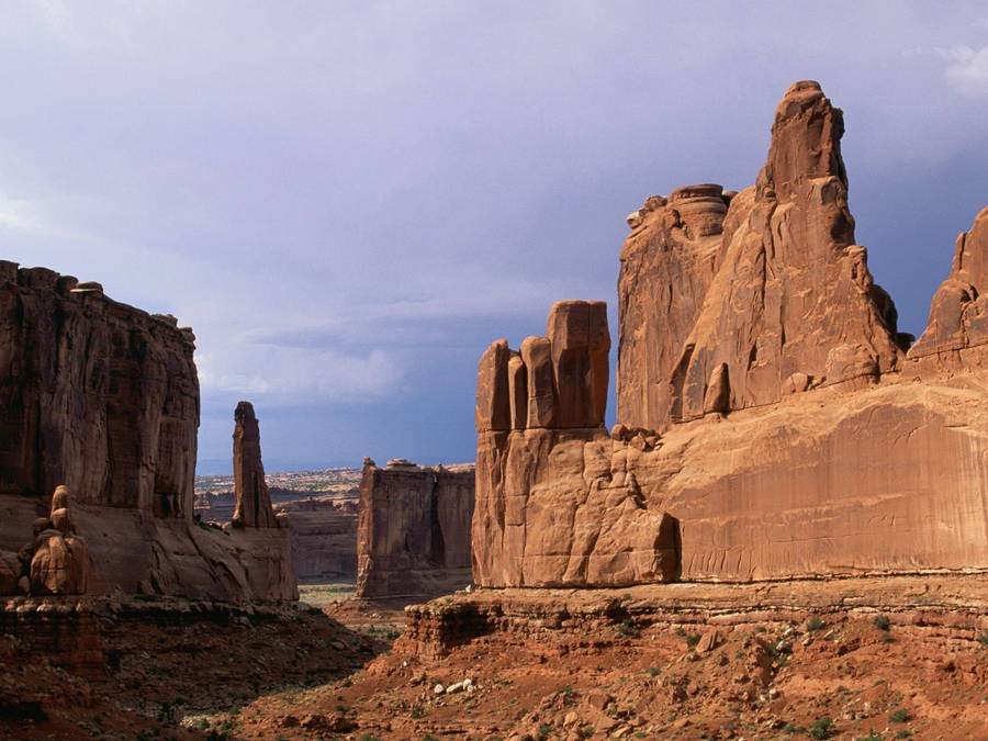 Tall Rock Formations At Arches National Park Wallpaper