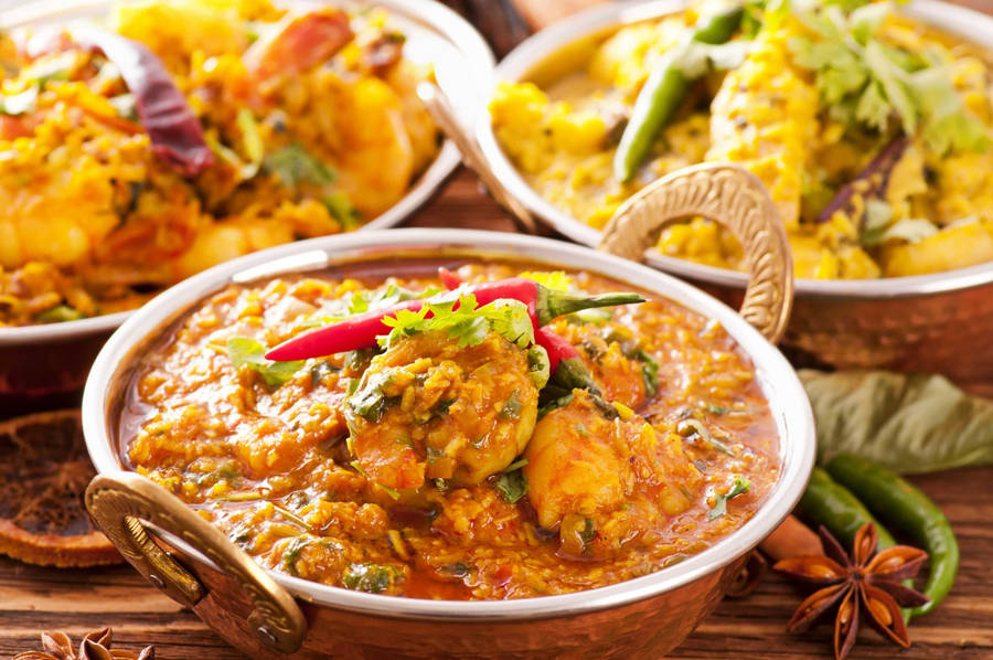 Tandoori Biryani And Yellow Curry - A True Symphony Of Indian Flavors! Wallpaper