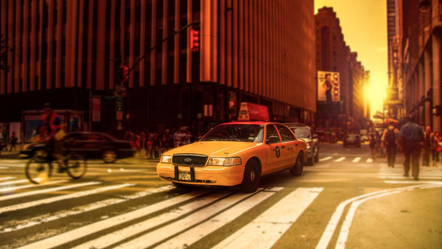 Taxi In The Road With Sunset Wallpaper