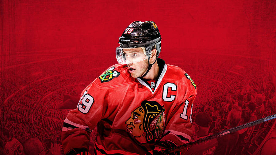 Team Captain No. 19, Jonathan Toews In Action Wallpaper