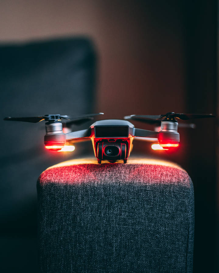 Technology Drone On Armchair Wallpaper