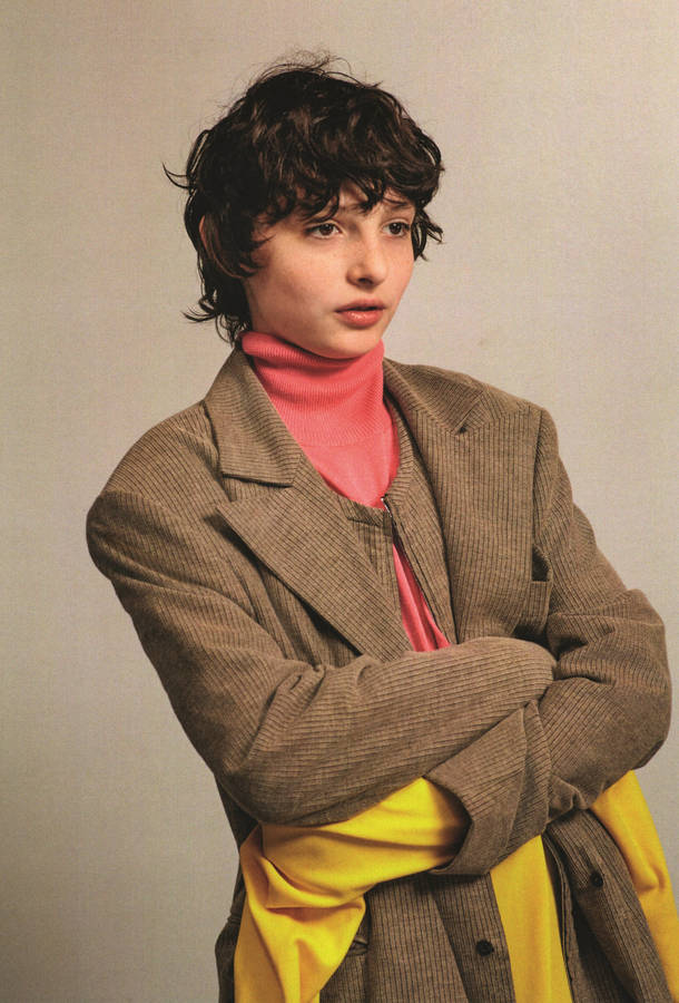 Teen Finn Wolfhard Modeling Wallpaper