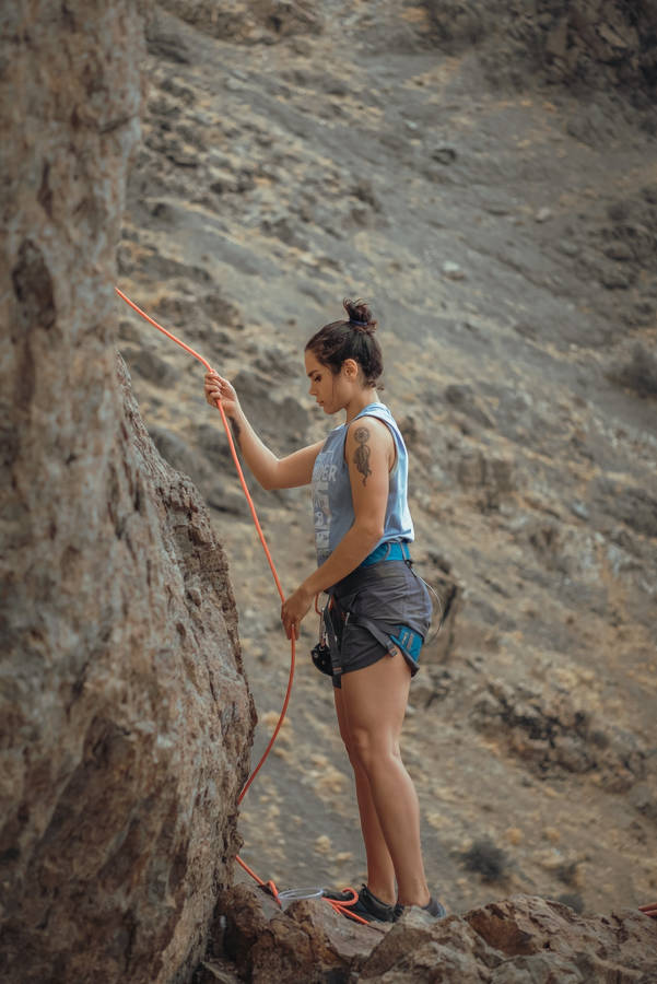 Teenage Girl About To Rappel Wallpaper