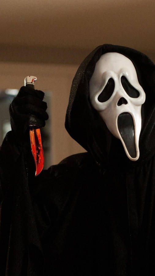 Tension Rises - A Mystery Beneath The Ghostface Mask In Scream Wallpaper