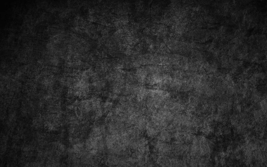 Textured Black Stone Wall Desktop Wallpaper