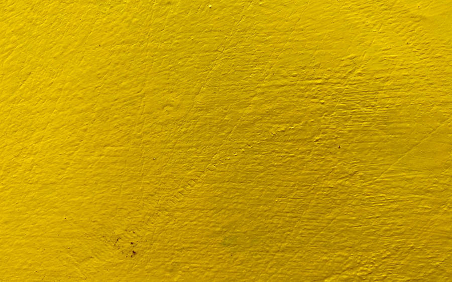 Textured Bright Yellow Stone Wall Wallpaper